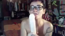 Tattooed Amber with sexy glasses who loves anal